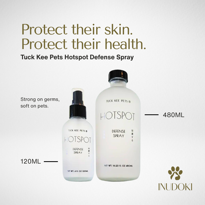 Two bottles of Tuck Kee Pets Hotspot Defense Spray