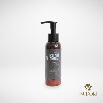 Bottle of Nudoki Instant Detangler on a white background